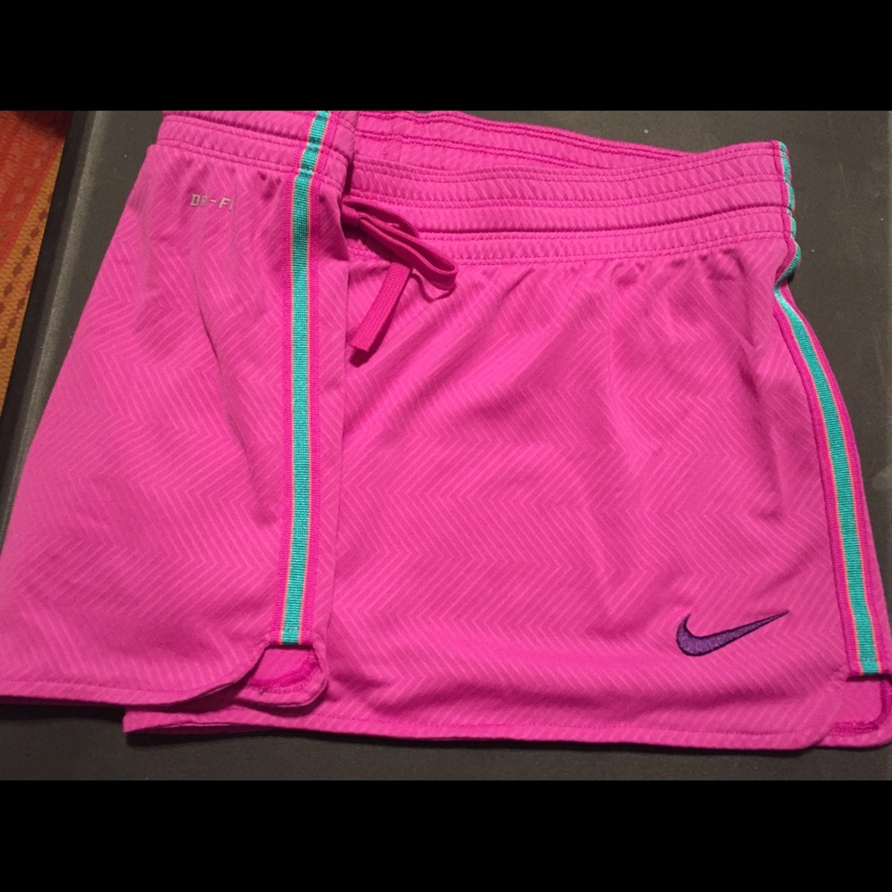 Pink Nike shorts